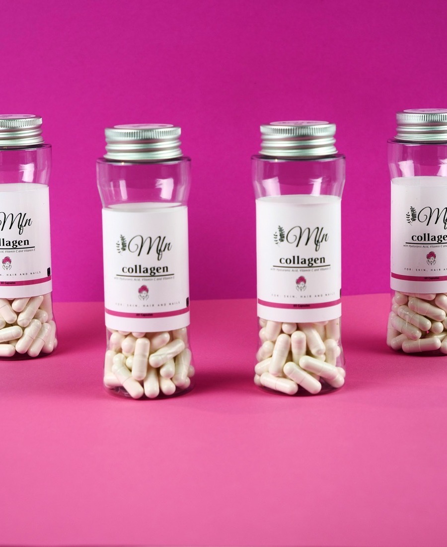 Four bottles of Mundo Fit Natural collagen with hyaluronic acid, vitamin C and E